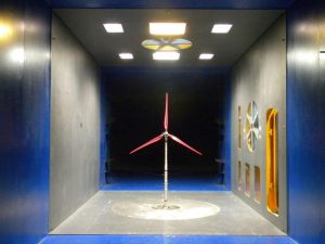 Passive and active strategies for rotor load reduction in wind turbines